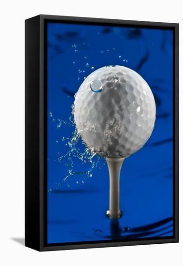 Blue Golf Ball Splash-Steve Gadomski-Framed Stretched Canvas