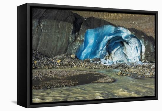 Blue ice and meltwater at the toe of the Athabasca Glacier, Jasper National Park, Alberta, Canada-Russ Bishop-Framed Stretched Canvas