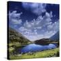 Blue Lake in the Pirin Mountains over Tranquil Clouds, Pirin National Park, Bulgaria-null-Stretched Canvas