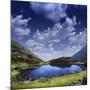 Blue Lake in the Pirin Mountains over Tranquil Clouds, Pirin National Park, Bulgaria-null-Mounted Photographic Print
