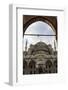 Blue Mosque under a Partially Cloudy Sky Through an Ornate Archway-Eleanor Scriven-Framed Photographic Print