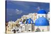 Blue Roofed Churches, Cities Embrace the Steep Mountain Sides, Santorini, Greece-Tom Norring-Stretched Canvas