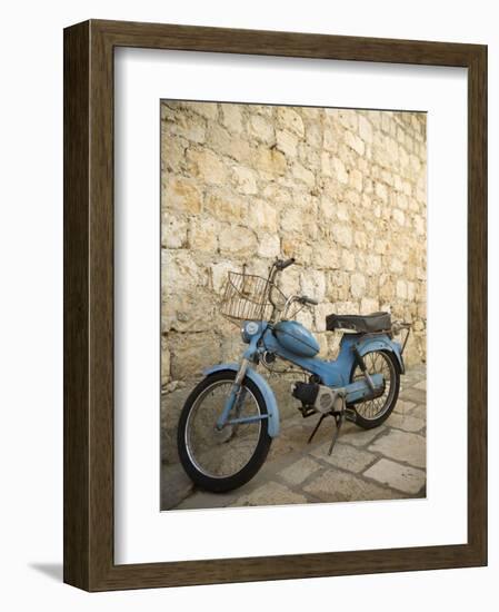 Blue scooter bike by old stone wall, Hvar Town, Hvar Island, Dalmatia, Croatia-Merrill Images-Framed Photographic Print