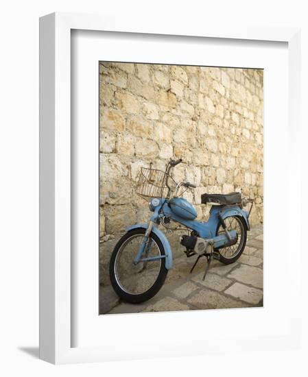 Blue scooter bike by old stone wall, Hvar Town, Hvar Island, Dalmatia, Croatia-Merrill Images-Framed Photographic Print