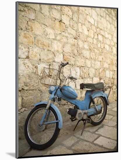 Blue scooter bike by old stone wall, Hvar Town, Hvar Island, Dalmatia, Croatia-Merrill Images-Mounted Photographic Print