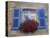 Blue Shuttered Windows and Red Flowers, Concarneau, Finistere, Brittany, France, Europe-Ruth Tomlinson-Stretched Canvas