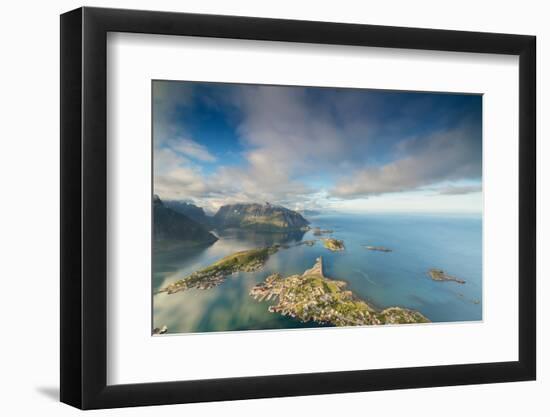 Blue sky and clouds frame the turquoise sea and the typical village, Reinebringen, Moskenesoya, Lof-Roberto Moiola-Framed Photographic Print