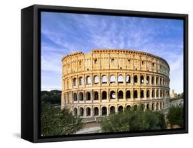 Blue sky at sunrise frames the ancient Colosseum (Flavian Amphitheatre), UNESCO World Heritage Site-Roberto Moiola-Framed Stretched Canvas