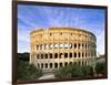 Blue sky at sunrise frames the ancient Colosseum (Flavian Amphitheatre), UNESCO World Heritage Site-Roberto Moiola-Framed Photographic Print