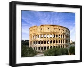 Blue sky at sunrise frames the ancient Colosseum (Flavian Amphitheatre), UNESCO World Heritage Site-Roberto Moiola-Framed Photographic Print