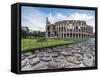 Blue sky at sunrise frames the ancient Colosseum (Flavian Amphitheatre), UNESCO World Heritage Site-Roberto Moiola-Framed Stretched Canvas