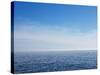 Blue Sky over Calm Sea-Norbert Schaefer-Stretched Canvas