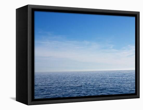 Blue Sky over Calm Sea-Norbert Schaefer-Framed Stretched Canvas