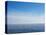 Blue Sky over Calm Sea-Norbert Schaefer-Stretched Canvas