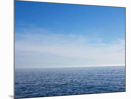 Blue Sky over Calm Sea-Norbert Schaefer-Mounted Photographic Print