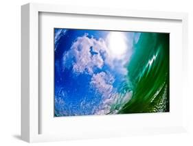 Blue Sky-puffy white clouds, blue sky, and sun in the sky seen through the curtain of a wave-Mark A Johnson-Framed Photographic Print