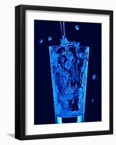 Blue Water Being Poured into Tumbler-null-Framed Photographic Print