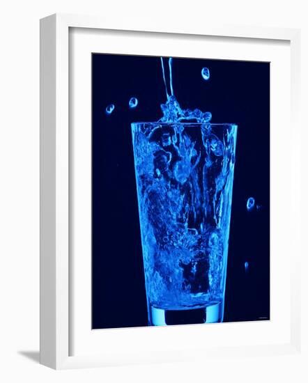 Blue Water Being Poured into Tumbler-null-Framed Photographic Print