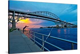 Blue Water Bridge at dusk, Port Huron, Michigan, USA-null-Stretched Canvas