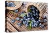 Blueberries Have Dropped from the Basket on an Old Wooden Table.-Volff-Stretched Canvas