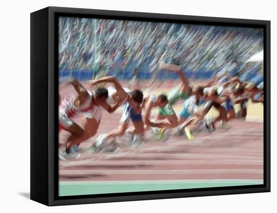 Blured Action at the Start of a Mens 100 Meter Track and Field Race-Paul Sutton-Framed Stretched Canvas