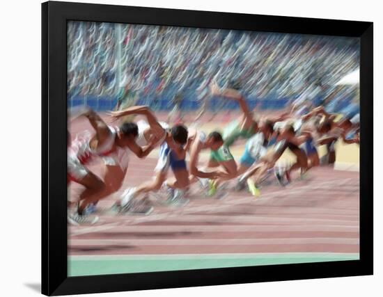 Blured Action at the Start of a Mens 100 Meter Track and Field Race-Paul Sutton-Framed Photographic Print