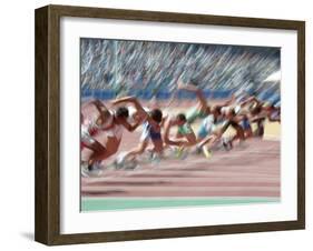 Blured Action at the Start of a Mens 100 Meter Track and Field Race-Paul Sutton-Framed Photographic Print