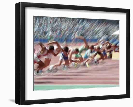 Blured Action at the Start of a Mens 100 Meter Track and Field Race-Paul Sutton-Framed Photographic Print