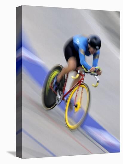 Blured Action of Female Cyclist Competing on the Velodrome-null-Stretched Canvas