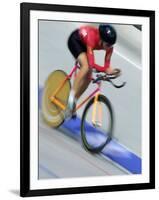 Blured Action of Female Cyclist Competing on the Velodrome-null-Framed Photographic Print