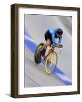 Blured Action of Female Cyclist Competing on the Velodrome-null-Framed Photographic Print