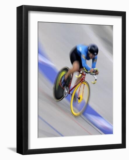 Blured Action of Female Cyclist Competing on the Velodrome-null-Framed Photographic Print