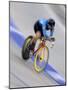 Blured Action of Female Cyclist Competing on the Velodrome-null-Mounted Photographic Print