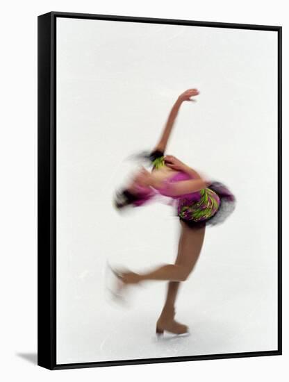 Blured Action of Female Figure Skater Preforming a Spin-Steven Sutton-Framed Stretched Canvas