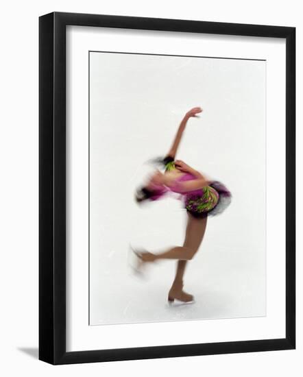 Blured Action of Female Figure Skater Preforming a Spin-Steven Sutton-Framed Photographic Print