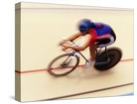 Blurred Action of Cyclist on the Track-Chris Trotman-Stretched Canvas