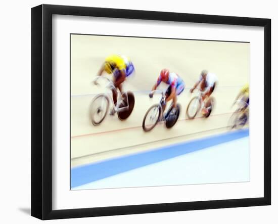 Blurred Action of Cyclist on the Track-Chris Trotman-Framed Photographic Print