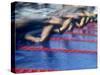 Blurred Action of Male Swimmers at the Start of a Race-null-Stretched Canvas