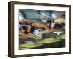 Blurred Action of Male Swimmers at the Start of a Race-null-Framed Photographic Print
