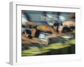 Blurred Action of Male Swimmers at the Start of a Race-null-Framed Photographic Print