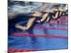 Blurred Action of Male Swimmers at the Start of a Race-null-Mounted Photographic Print