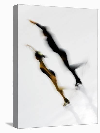 Blurred Action of Pairs Figure Skaters, Torino, Italy-Chris Trotman-Stretched Canvas