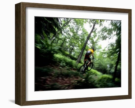 Blurred Action of Recreational Mountain Biker Riding on the Trails-null-Framed Photographic Print