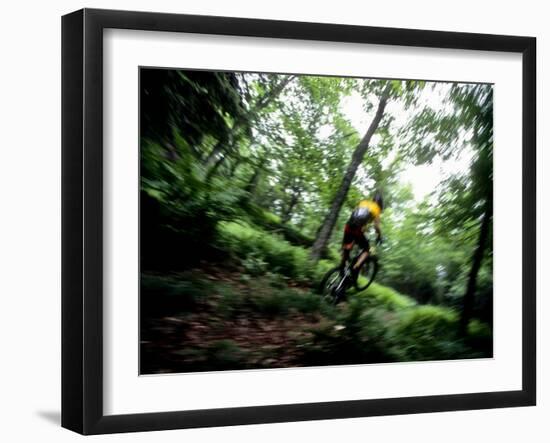 Blurred Action of Recreational Mountain Biker Riding on the Trails-null-Framed Photographic Print