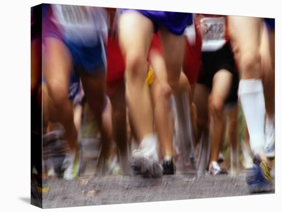 Blurred Action of Runner's Legs Competing in a Race, New York, New York, USA-Chris Trotman-Stretched Canvas