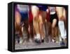 Blurred Action of Runner's Legs Competing in a Race-null-Framed Stretched Canvas