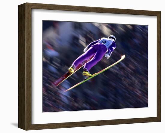 Blurred Action of Ski Jumper Flying Throught the Air-null-Framed Photographic Print