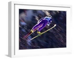 Blurred Action of Ski Jumper Flying Throught the Air-null-Framed Photographic Print