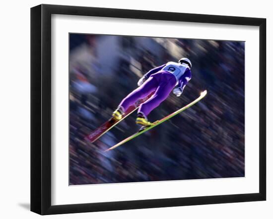 Blurred Action of Ski Jumper Flying Throught the Air-null-Framed Photographic Print