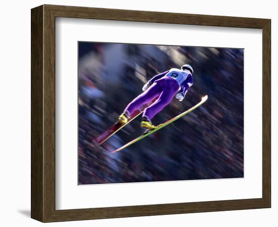 Blurred Action of Ski Jumper Flying Throught the Air-null-Framed Photographic Print